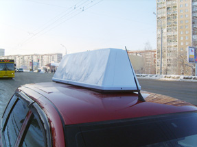 Рекламный световой короб на такси «Универсал»